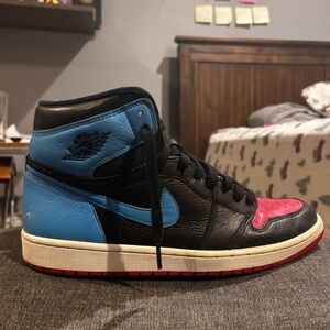 UNC to CHI Air Jordan 1.  Size 12 Women, size 10.5 Men.